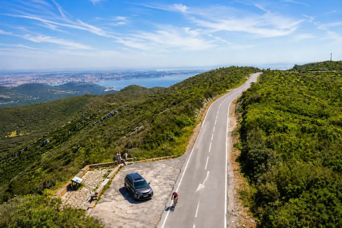 View over the Serra da Arrábida coast and turquoise bay from a ridge viewpoint